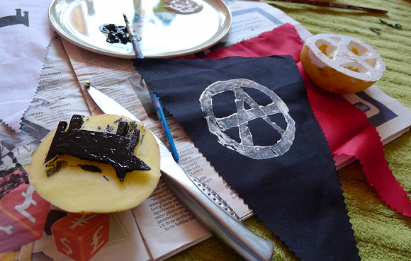Anarchist bunting takes shape at the Brixton Frontline of Buntline
