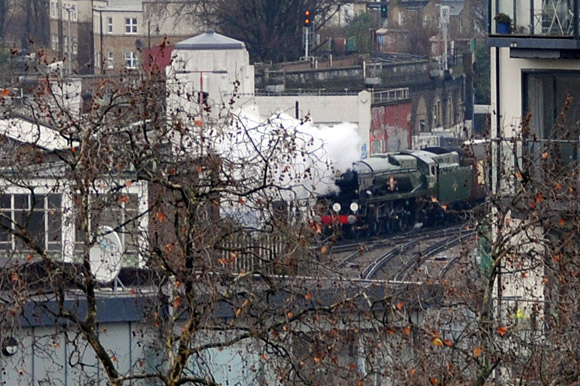 Steam train puffs through Brixton - backwards!