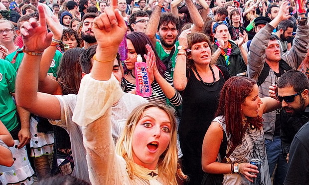 Faces in the crowd: scenes from Boomtown's Town Centre, Boomtown Fair Festival 2015, Winchester, England, UK, August 2015