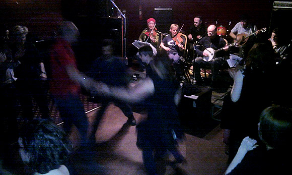 Drinking and stripping the willow at a Burns night ceilidh in Stockwell