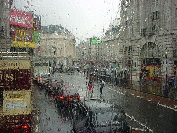 London in the rain, seen from a double decker bus