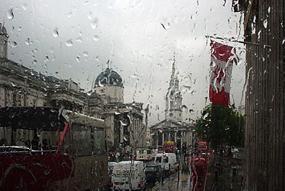 London in the rain, seen from a double decker bus
