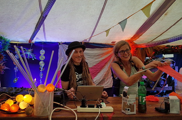 Green Gathering 2016 in photos. Night scenes: camp fires, upside down performers, bands and DJs, Chepstow, Wales, August 2016