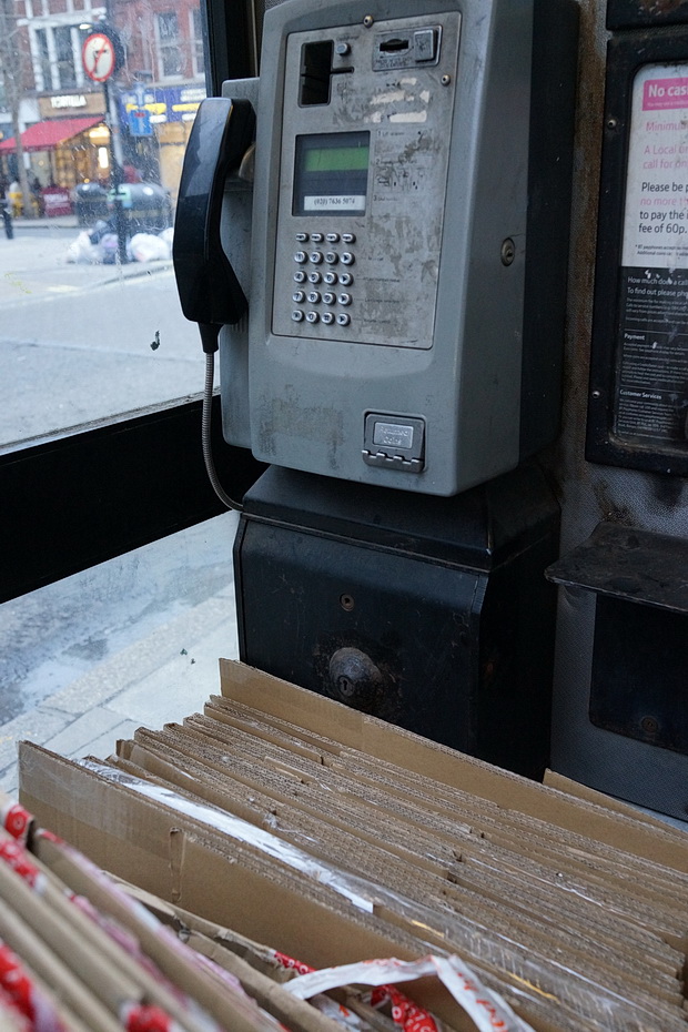 The London phonebox that's full of cardboard - in photos