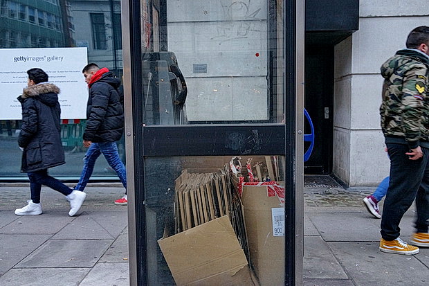 The London phonebox that's full of cardboard - in photos
