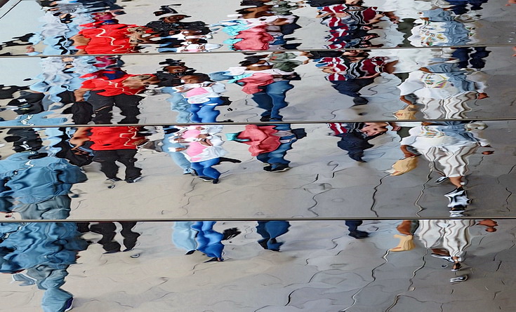 Oxford Street Reflections - abstract human shapes on a mirrored roof