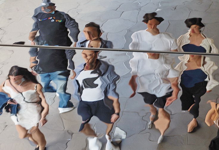 Oxford Street Reflections - abstract human shapes on a mirrored roof