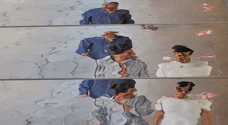 Oxford Street Reflections - abstract human shapes on a mirrored roof