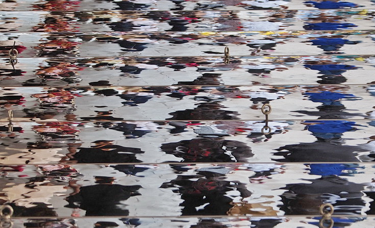 Oxford Street Reflections - abstract human shapes on a mirrored roof
