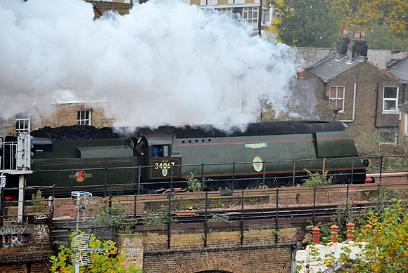 Christmas comes early as two steam locos pass in quick succession