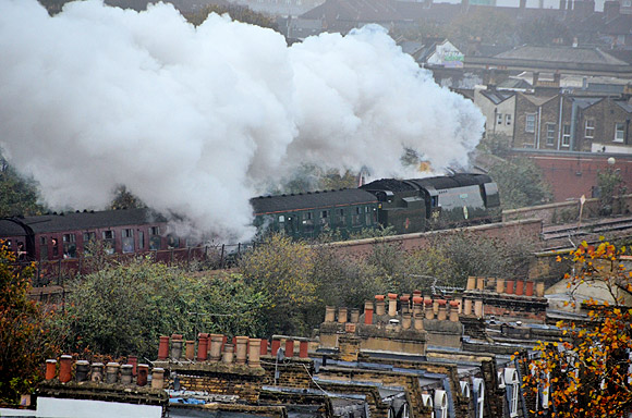 Christmas comes early in Brixton as two steam locos pass in quick succession