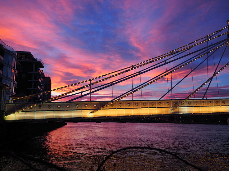 In photos: a stunning winter sunset by the River Thames, featuring the Albert and Chelsea Bridges