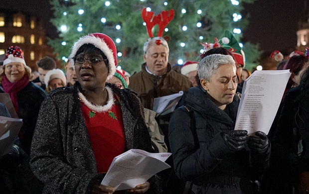 Choirs sing traditional Christmas carols in Trafalgar Square, London, December 2015