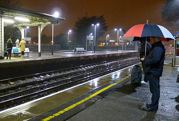 Wandsworth Town station in the early evening rain