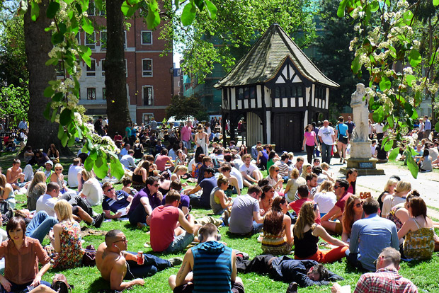Soho Square swelters in the early summer sun
