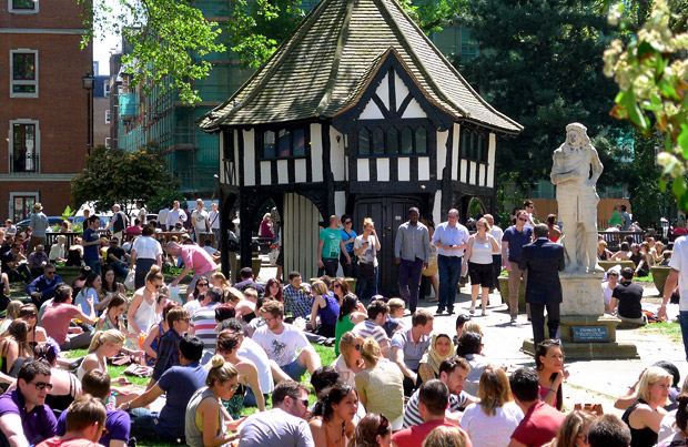 Soho Square swelters in the early summer sun