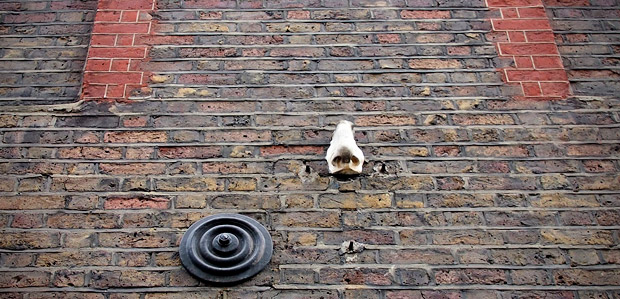 Looking up the nose of Meard Street, Soho, London