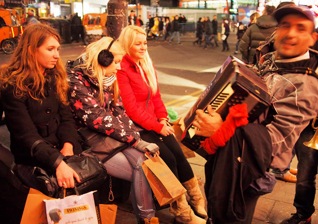Pic of the day: accordion player tries to impress young girls. Pretty much fails
