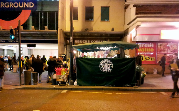 Tax-shirking Starbucks extend their branding onto Brixton flower stall