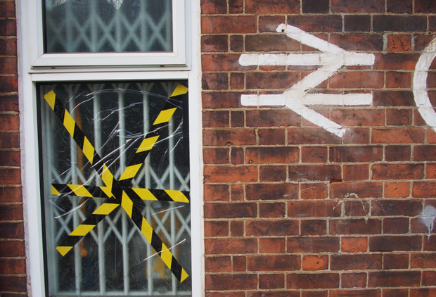 Pic of the day: Otford Station - broken window, hazard tape and BR symbol