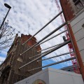 Houses held up by metal girders, Oxford Street, London