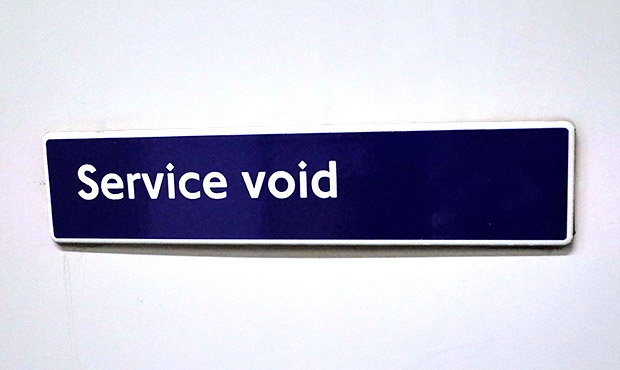 Two baffling London Underground signs