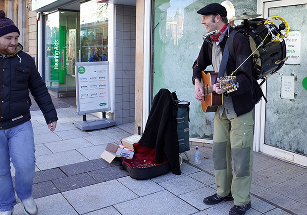 Things you don't see so much: a one man band plys his trade in Cardiff Queen Street