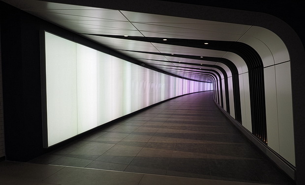 Walking through the LED lightwall tunnel at Kings Cross station