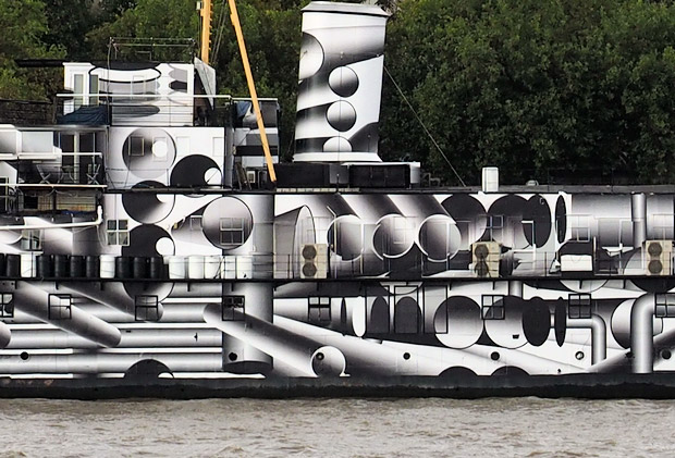 HMS President covered in dazzle camouflage on the River Thames, London