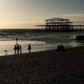 Brighton's derelict West Pier in the winter sun and storms - in photos