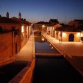 The canals and stunning architecture of Comacchio at night, northern Italy