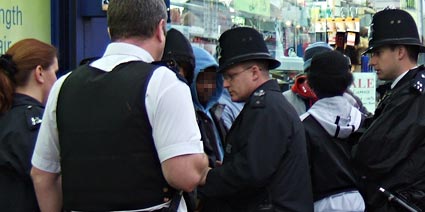 Police and Thieves, Brixton street scenes, January 17th  2006, Brixton, London SW9