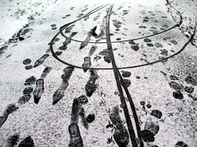 Winter footsteps, Brixton, Lambeth, south London SW9
