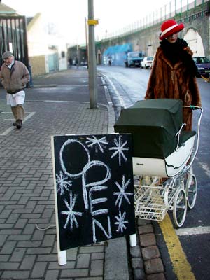 Second hand clothes store, Brixton Station Road market, Brixton, London SW9