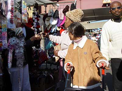 Brixton bustle, Pope's Road market, Brixton, Lambeth, London SW9, October 2003