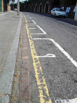 Street painted numbers, Brixton Station Road, Brixton, Lambeth, London, England SW9