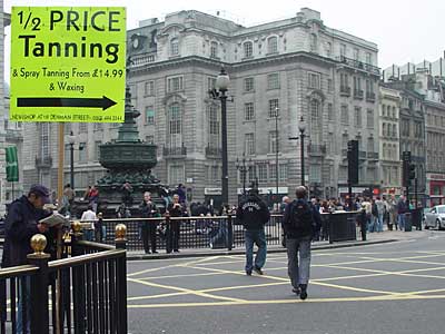 Half price tanning, Piccadilly Circus, London W1