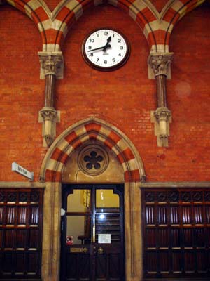 Gothic arches and clock, Booking office, St Pancras station, June 2003 London UK