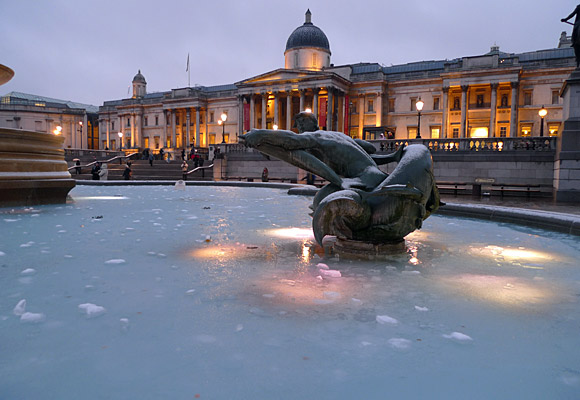 London snow scenes - frozen fountains in Trafalgar Square and snow on Coldharbour Lane, Brixton, January 2010