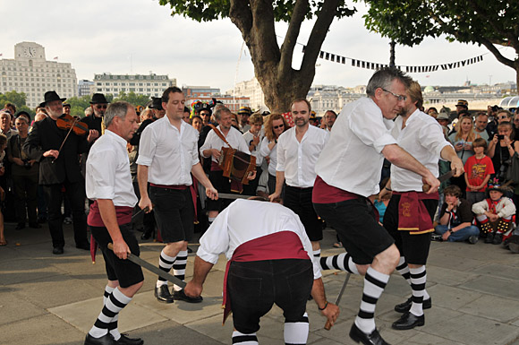 Morris Dancing event on Southbank by the River Thames, with the Hammersmith Morris Men, Mortimer's Morris, Pecsaetan Morris, Boggart's Breakfast, Eynsham Morris, Stone Monkey Sword Dancers, Moss Brothers and Gog Magog Molly, London, September 4th 2010