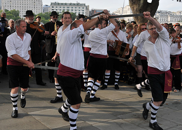 Morris Dancing event on Southbank by the River Thames, with the Hammersmith Morris Men, Mortimer's Morris, Pecsaetan Morris, Boggart's Breakfast, Eynsham Morris, Stone Monkey Sword Dancers, Moss Brothers and Gog Magog Molly, London, September 4th 2010
