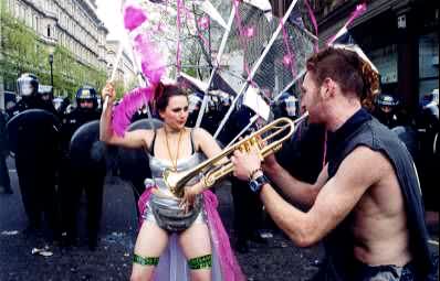 dancers and riot police