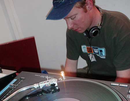 PK rustles around in his record bag, Offline 2 at the Brixton Ritzy, March 13th 2004.