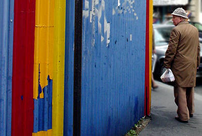 Painted fence, old man
