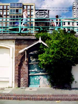 Beach hut with porch, Brighton promenade, May 2003