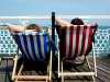 Relaxing on Brighton pier in a deckchair, Brighton