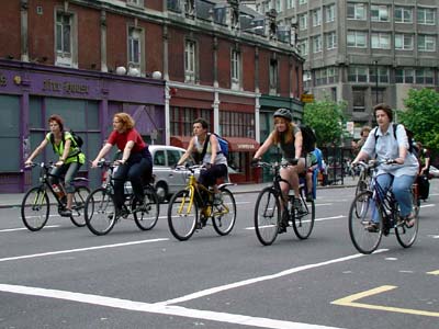 Formation cycling, Farringdon Street, Critical mass bike ride, London, 27th June 2003