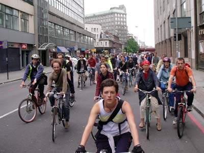 Cycling up Farringdon RoadCritical mass bike ride, London, 27th June 2003