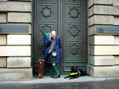 Kilt and mobile phone, Royal Mile, Edinburgh
