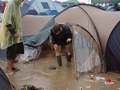 Salvaging belongings, Glastonbury Festival, Pilton, Somerset, England June 2005
